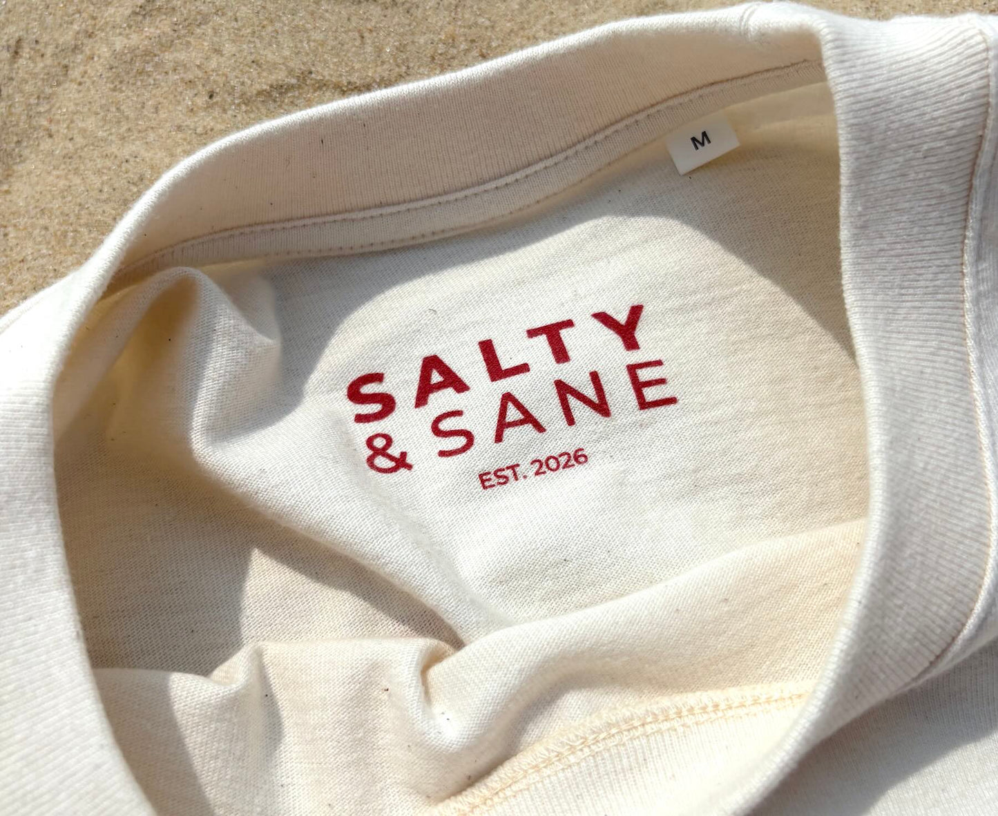 Neck label detail on Salty & Sane Cropped Oversized T-shirt