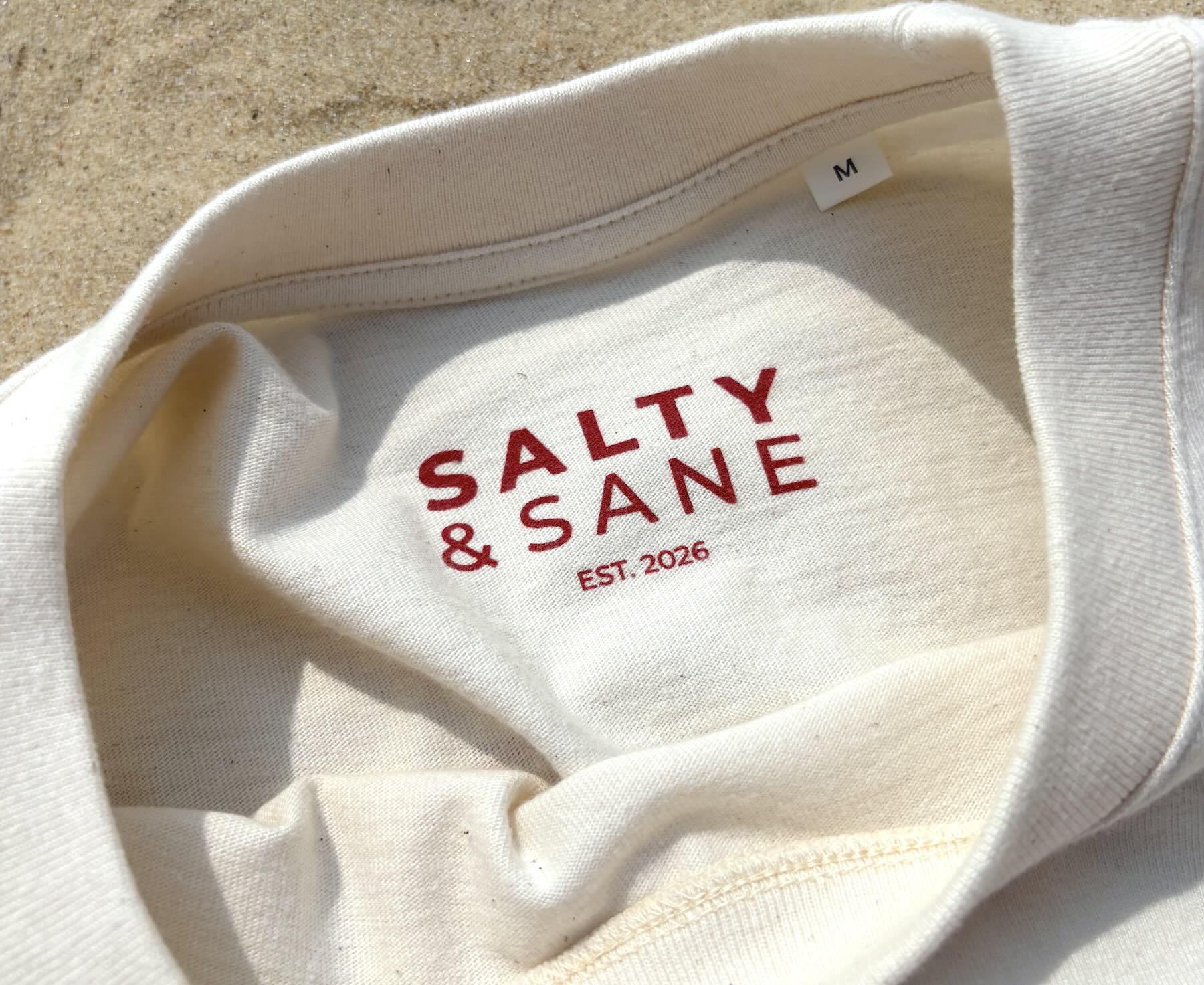 Neck label detail on Salty & Sane Cropped Oversized T-shirt