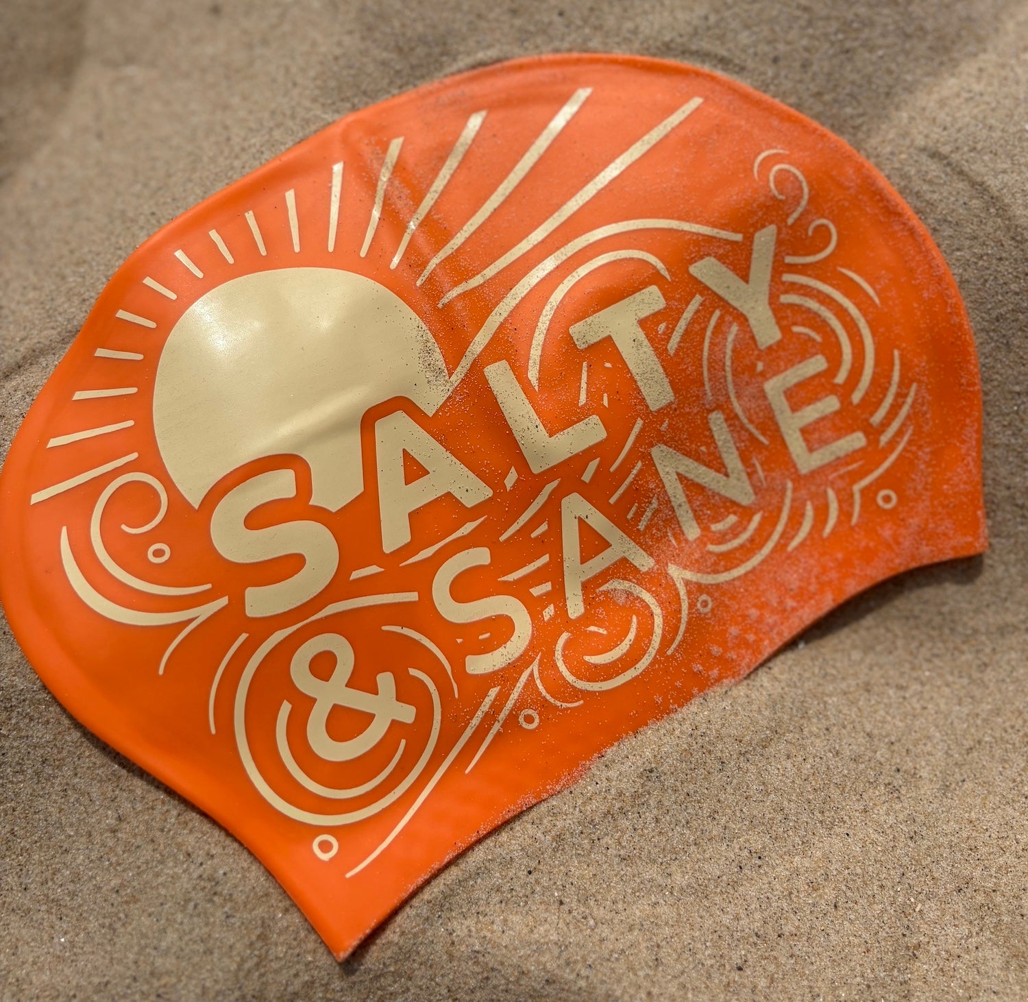 Orange long hair silicone swim hat by Salty & Sane